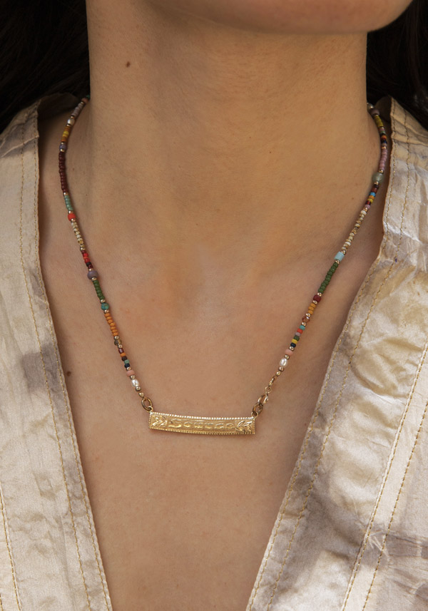 CATHERINE MICHIELS GOLD PLAQUE “SOURCE” NECKLACE